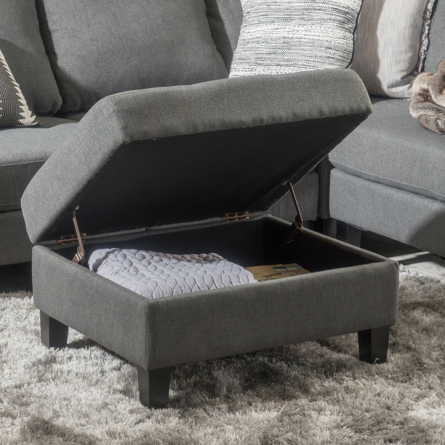 Ottoman With Birch Wood Legs And Cushioned Top For Comfort